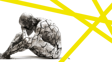 Uomo seduto e linee gialle