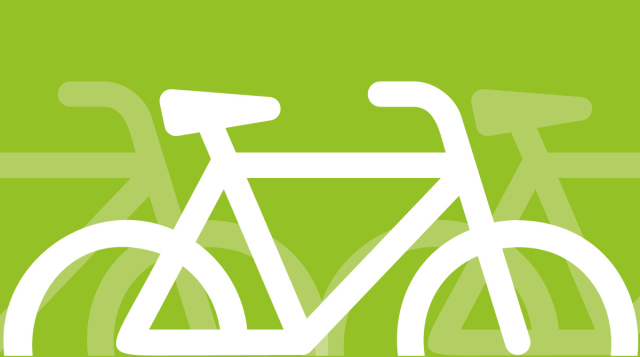 bicicletta bianca su fondo verde